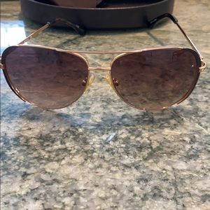 Michael Kors sunglasses.